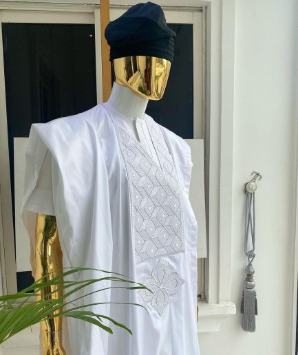 A voil jacquard cocaine white with an aligned square pattern design Agbada