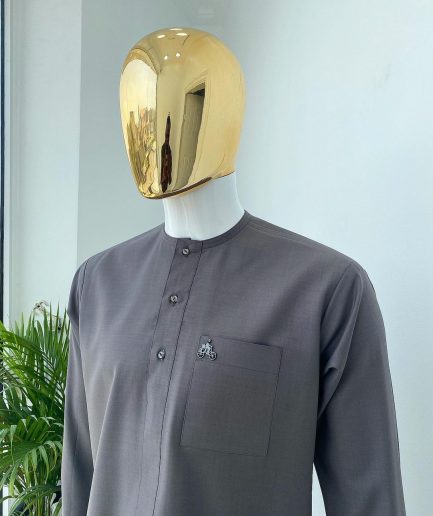 A Space Grey senator with a Swarovski button details African Kaftan