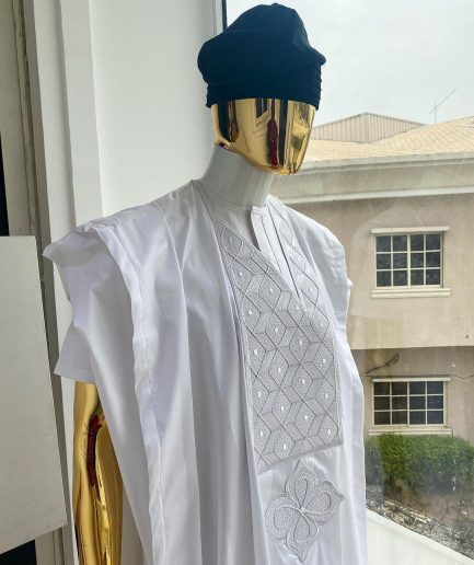 A voil jacquard cocaine white with an aligned square pattern design Agbada