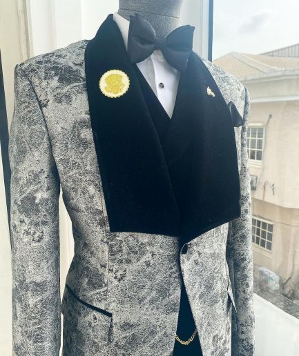 A dispersed silver and black pattern jacquard shawl lapel tuxedo suit