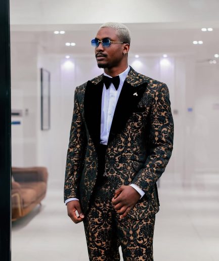 A Gold and black mandarin metallic floral jacquard, peak lapel tuxedo suit