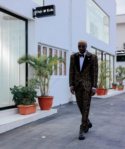 A Gold and black mandarin metallic floral jacquard, peak lapel tuxedo suit