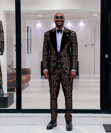 A Gold and black mandarin metallic floral jacquard, peak lapel tuxedo suit