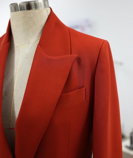 A Rust Orange Peak Lapel, Double-Breasted Jacket.