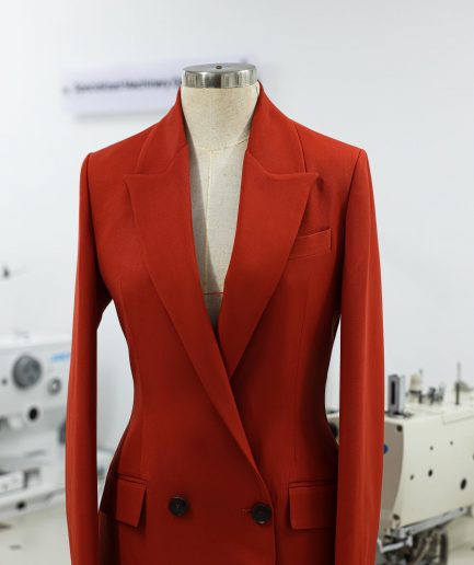A Rust Orange Peak Lapel, Double-Breasted Jacket.