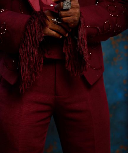 A monochrome, knitted, hand-woven aso-oke, matching bead layering tuxedo suit