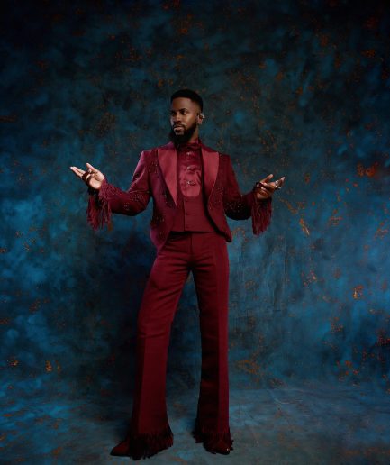 A monochrome, knitted, hand-woven aso-oke, matching bead layering tuxedo suit