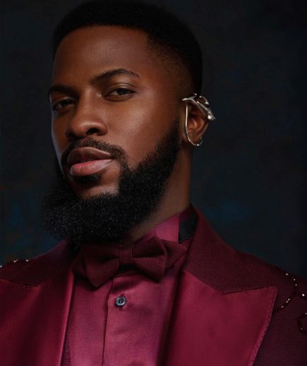 A monochrome, knitted, hand-woven aso-oke, matching bead layering tuxedo suit