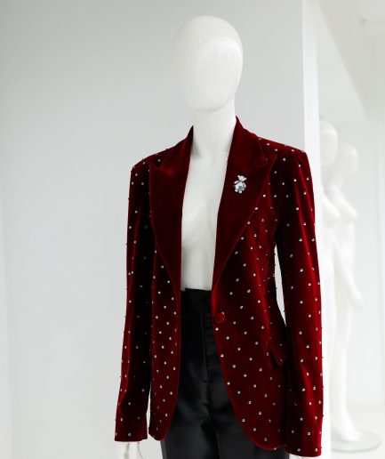 A Lipstick Red, Soaked Velvet Peak Lapel Suit.