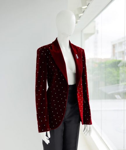 A Lipstick Red, Soaked Velvet Peak Lapel Suit.