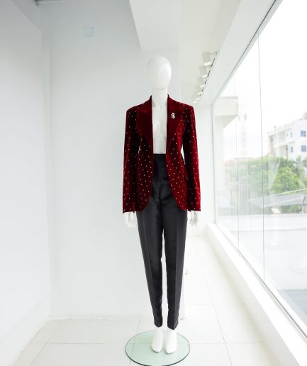 A Lipstick Red, Soaked Velvet Peak Lapel Suit.