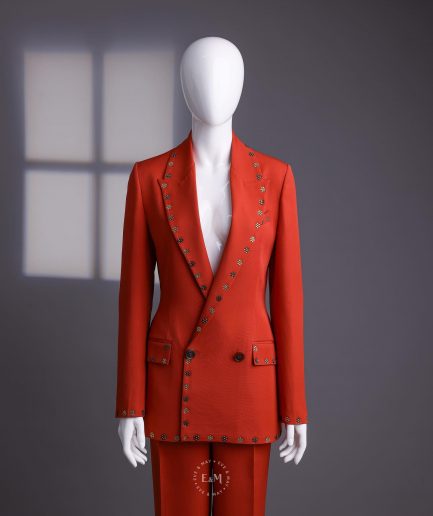 A rust orange peak lapel with shades of brown ss16 Swarovski stone details double-breasted jacket.