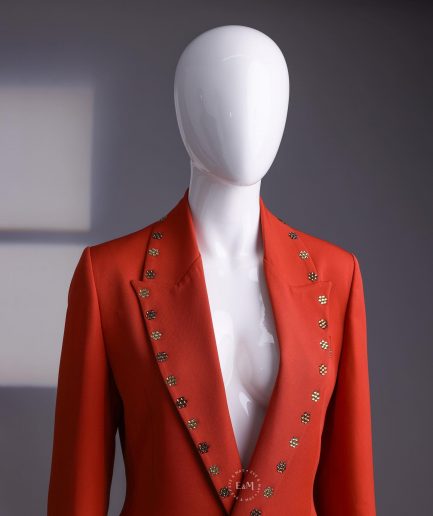 A rust orange peak lapel with shades of brown ss16 Swarovski stone details double-breasted jacket.