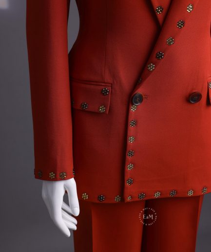 A rust orange peak lapel with shades of brown ss16 Swarovski stone details double-breasted jacket.