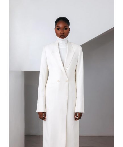 An Ivory White, Closed Notch Double-Breasted Suit