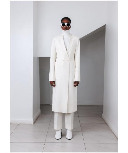 An Ivory White, Closed Notch Double-Breasted Suit