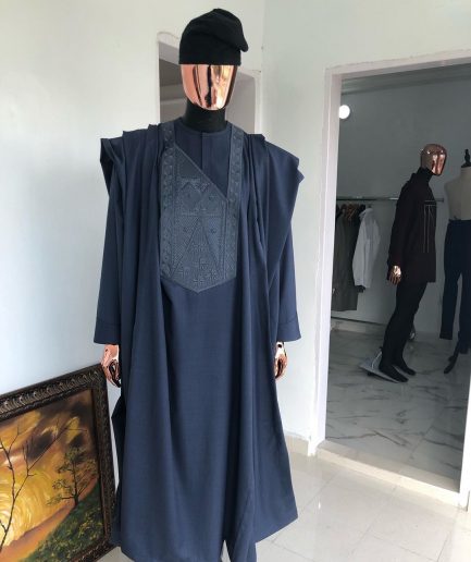 A Navy Blue with connected embroidery Agbada and Hand woven Yoruba Hat