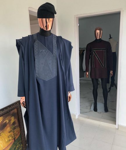 A Navy Blue with connected embroidery Agbada and Hand woven Yoruba Hat