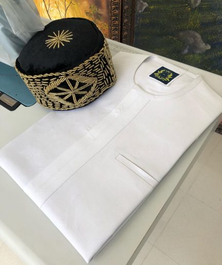 A White with a front-flap traditional African Kaftan and sokoto