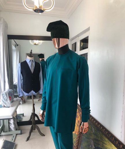 An Emerald Green front flap African senator Kaftan with hand woven velvet Egba Yoruba hat