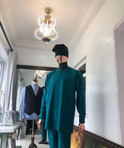An Emerald Green front flap African senator Kaftan with hand woven velvet Egba Yoruba hat