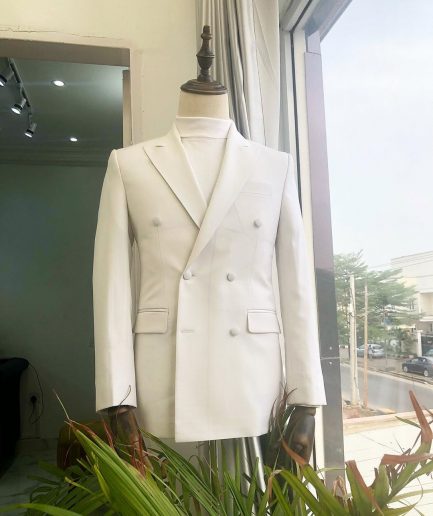 An Ivory White Double Breasted Peak Lapel Suit