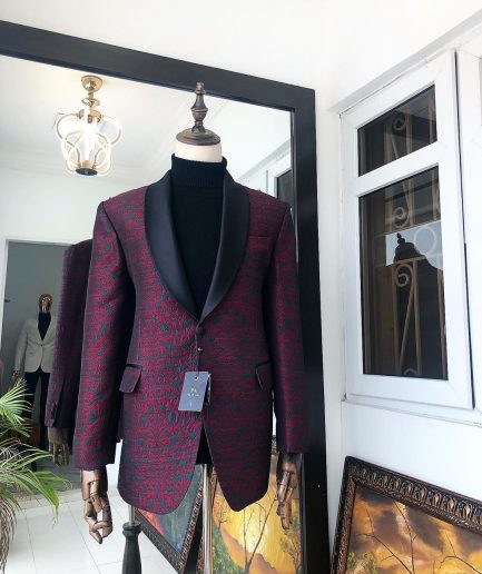 A Burgundy And Black Paisley Shawl Lapel Tuxedo Suit