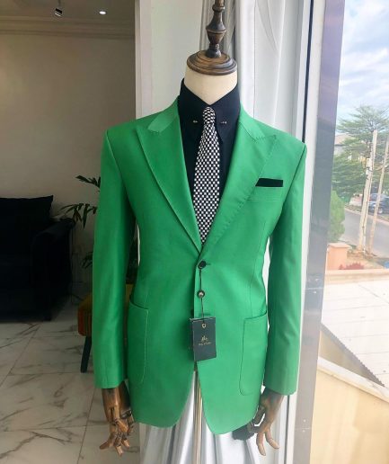 A “Rich Green” peak lapel, "hand knitted" patch pocket Suit
