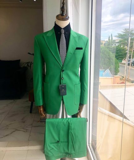 A “Rich Green” peak lapel, "hand knitted" patch pocket Suit