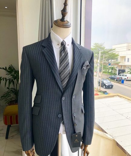 A Revolutionary “Catch Me If You Can” Grey Bold Pencil Stripe notch lapel double side-breasted Suit.