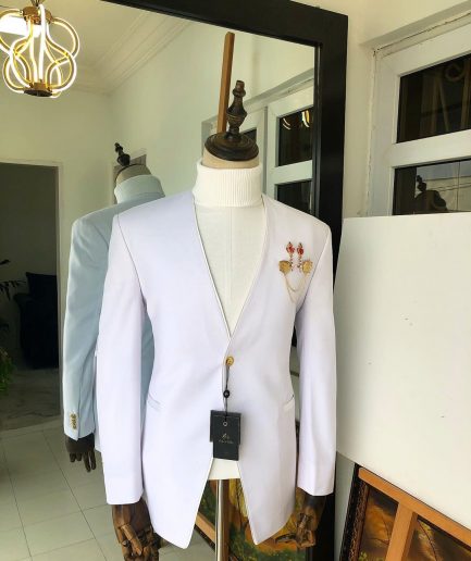 A White “Polaris” lapeless one button tuxedo Suit