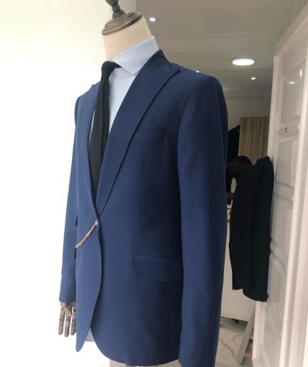 A Light Blue, Peak Lapel, One Button Tailored Suit with Gold Detailing