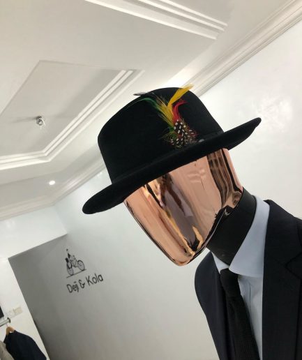 Black Bowlers Hat with feathers detailings and design