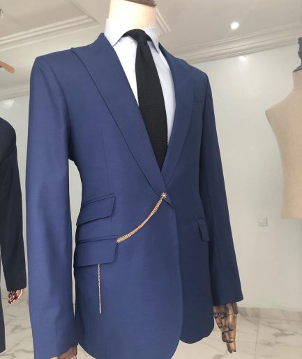 A Light Blue, Peak Lapel, One Button Tailored Suit with Gold Detailing