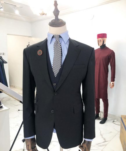 A charcoal balck notch lapel suit