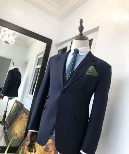 A Navy Blue notch lapel Suit