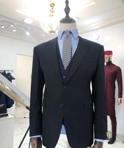 A charcoal balck notch lapel suit