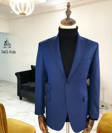 A Navy Blue Peak Lapel Business Suit