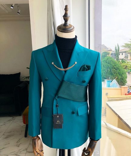 A reloaded Teal Green Tuxedo Double breasted strap “Oranmiyan” Suit