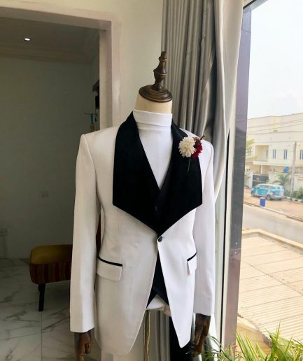 An Ivory White, Black Velvet Lapel tuxedo Suit