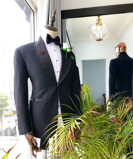 A Charcoal Black Shawl Lapel Tuxedo Suit.
