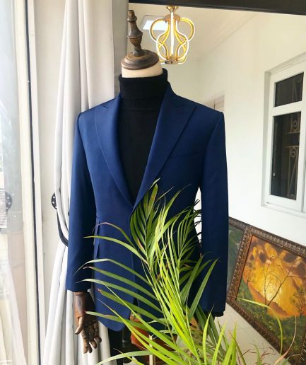 A Navy Blue Peak Lapel Business Suit