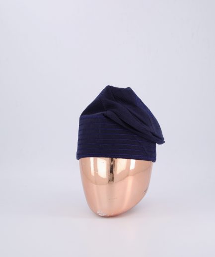 A Navy blue with embroidery Yoruba traditional hat or fila