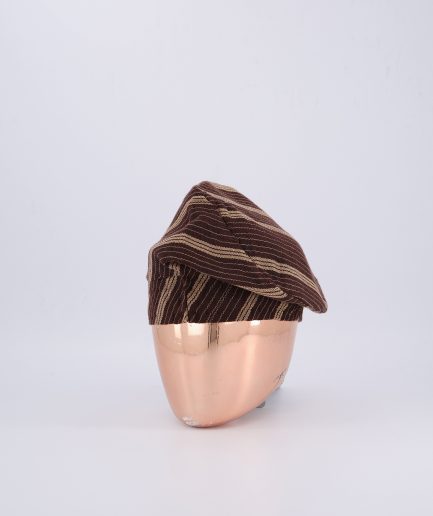 A Chocolate brown Yoruba traditional hat or fila