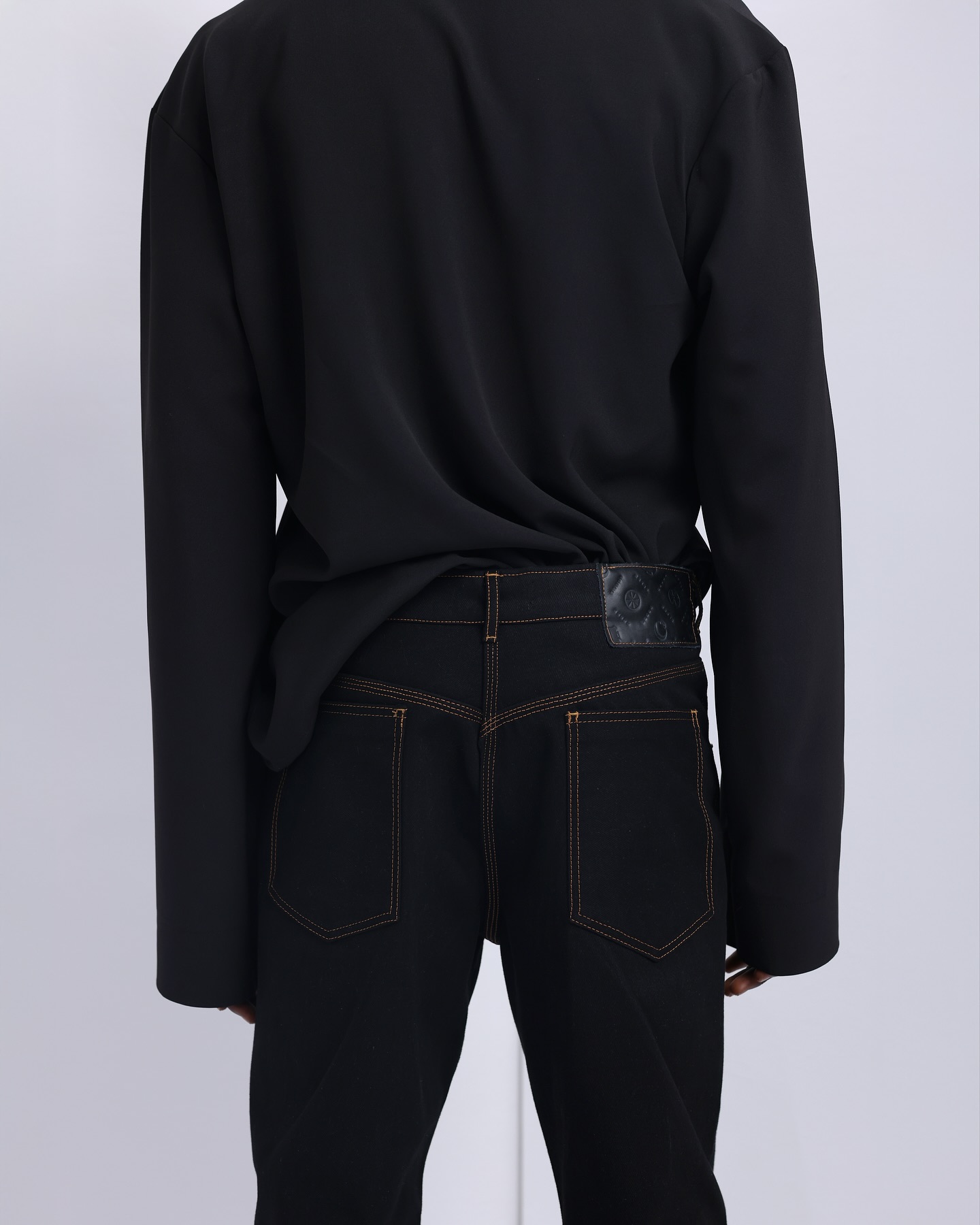 Shop Black V-Cut Neck T-Shirt with Metal Badge | Deji & Kola