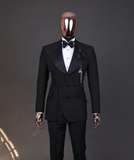 An Inverted “Pirate”, knitted, charcoal black jacquard with peak lapel, 9 button tuxedo suit.