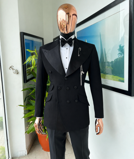 An Inverted “Pirate”, knitted, charcoal black jacquard with peak lapel, 9 button tuxedo suit.